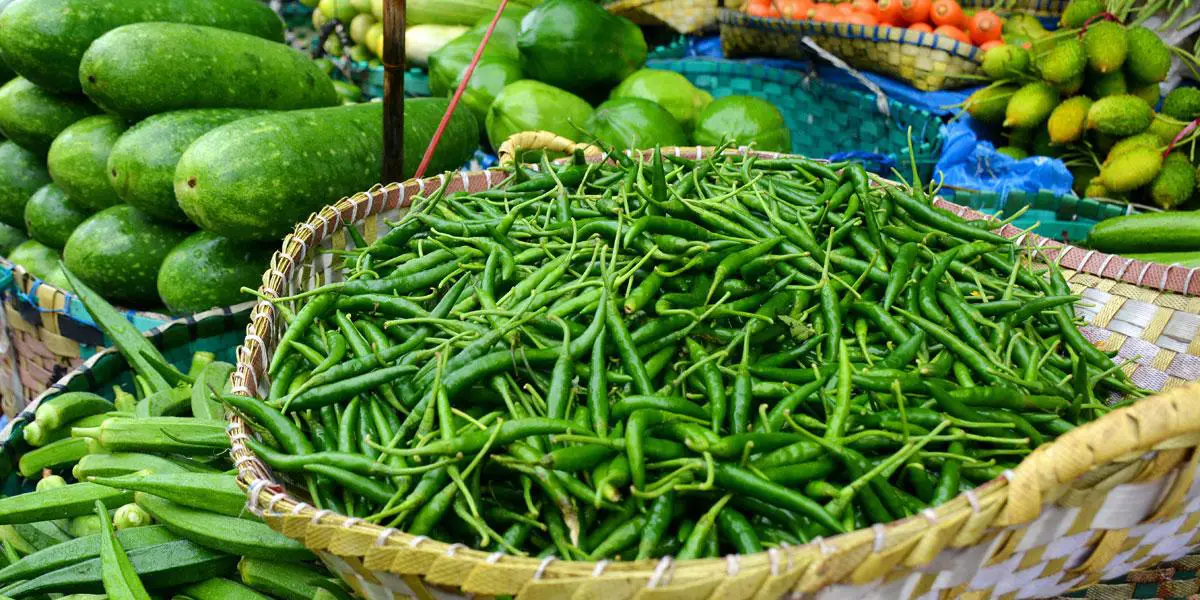 বৃষ্টিতে কাঁচাবাজারে 'আগুন'