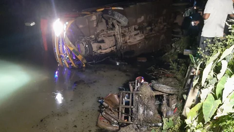 গাড়ি দুটি উল্টে সড়কের পাশের খাদে পড়ে যায়। ছবি: সংগৃহীত